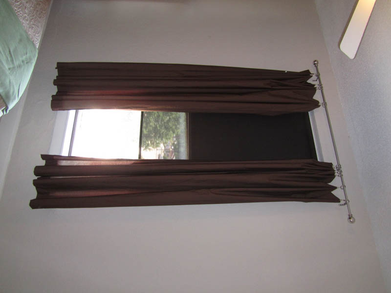 Bedroom Window After Solar Screen Shade Installation