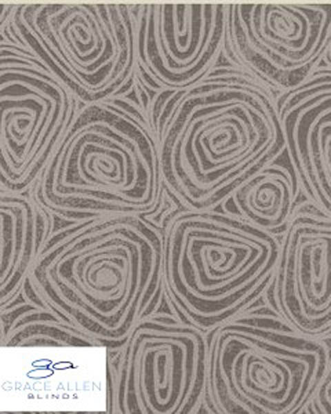 A pewter metallic thread is woven with natural colored background