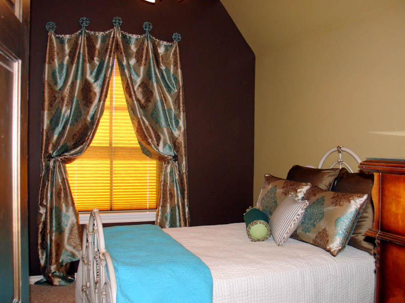 guest suite with custom drapery and pillows